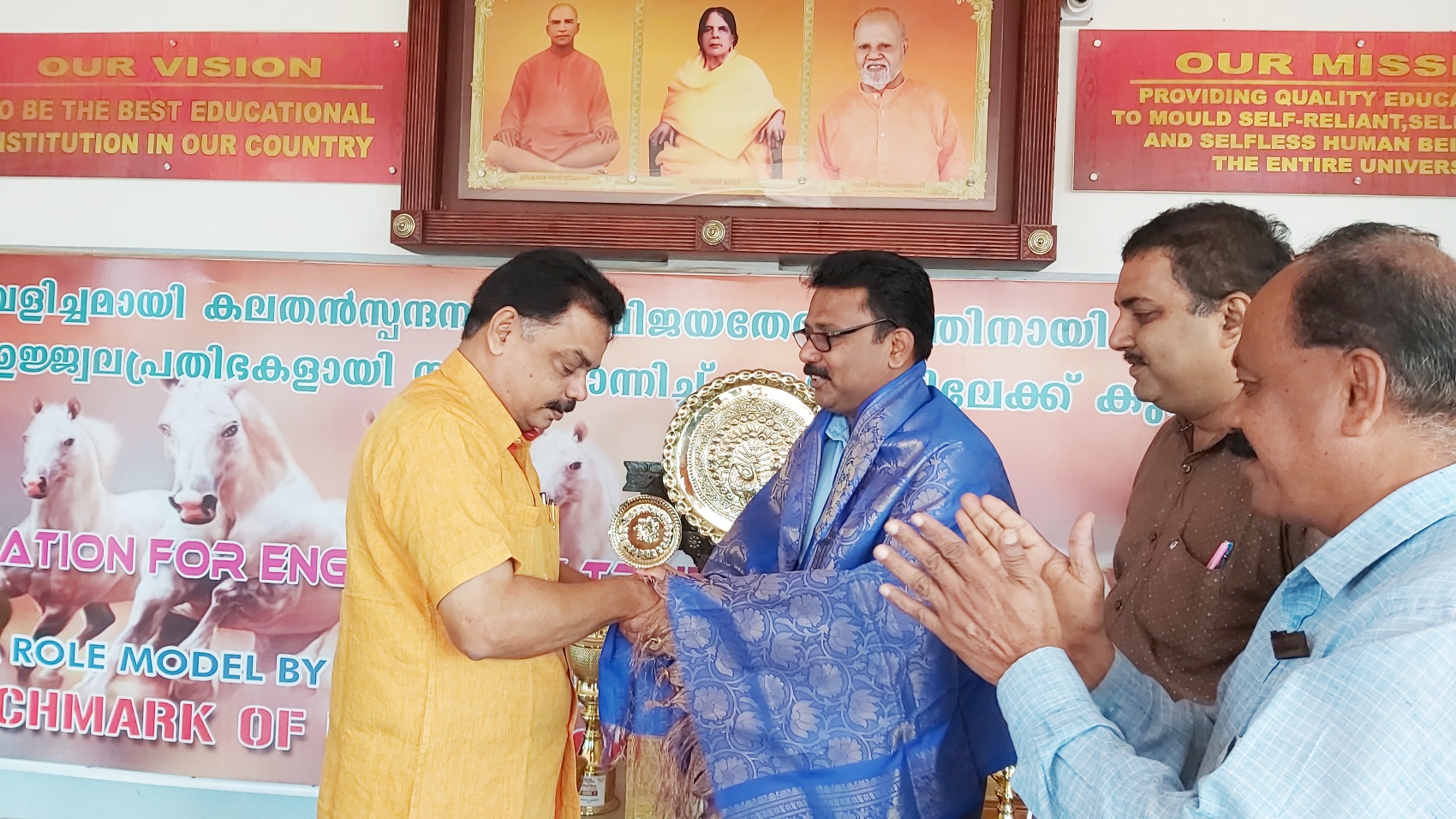 MLA Alathur K.D.Prasennan Honouring Principal