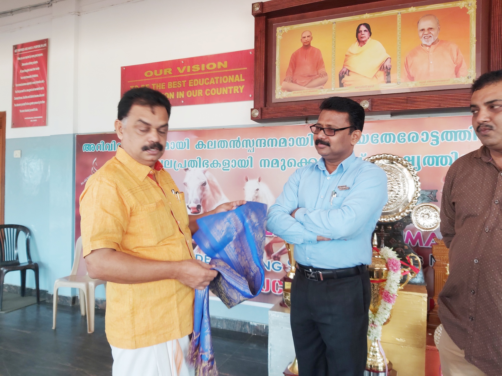 MLA Alathur K.D.Prasennan Honouring Principal